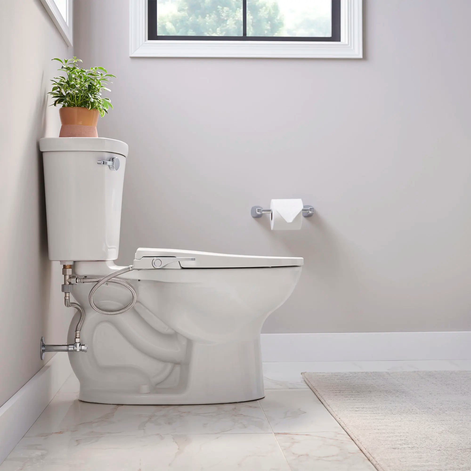 AquaWash® Slim Non-Electric SpaLet® Bidet Seat With Manual Operation // WHITE // 155720_B-215AA104.020_8033A65G.020_Side_0_CDNwebp_9cacec6a-56b2-4838-abe5-6d39df66cd10.webp