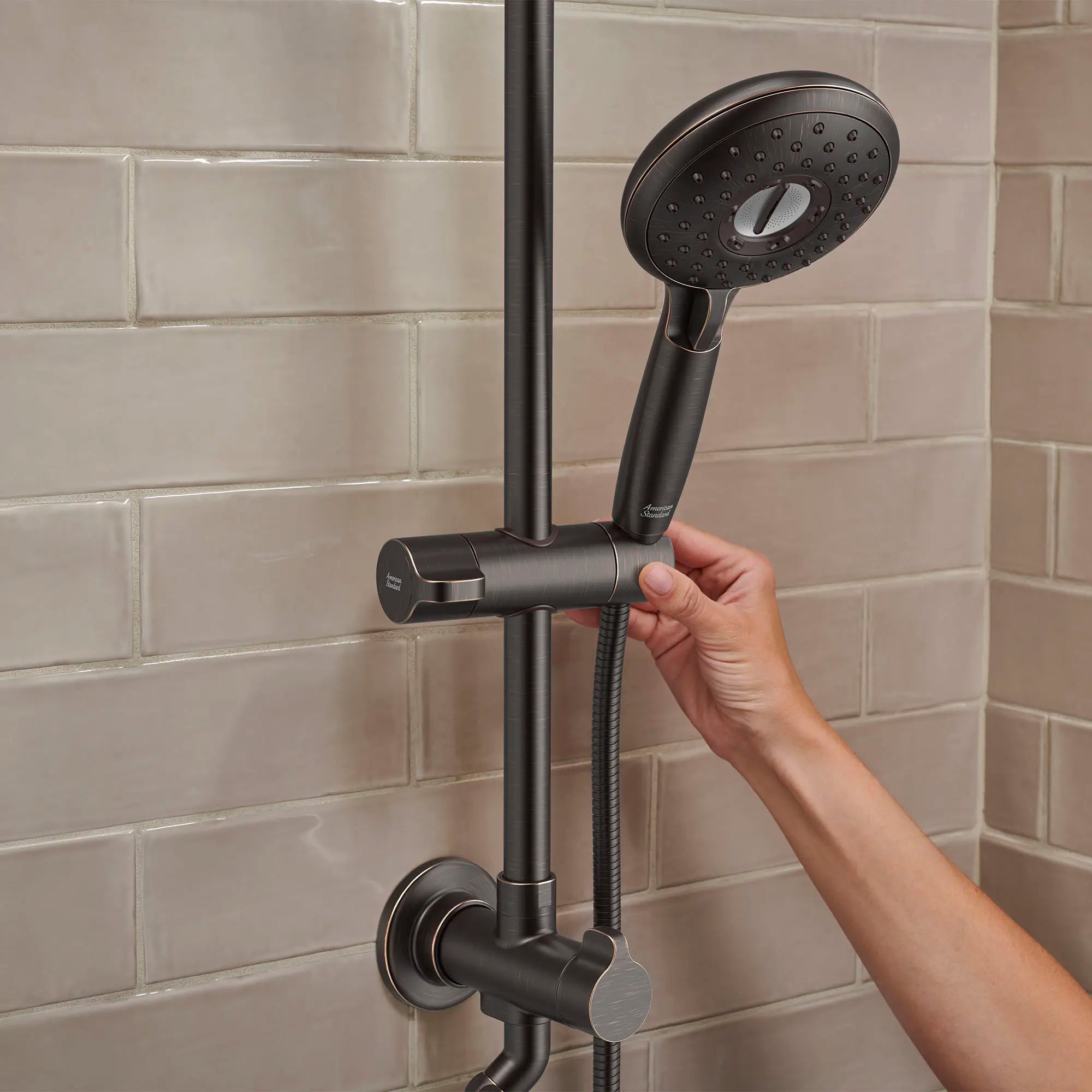 Spectra Versa® 24-Inch 4-Function 1.8 gpm/6.8 L/min Shower System With Rain Showerhead // LEGACY BRONZE // 166662_SpectraVersa_Lifestyle_1029072780_0002_Jul2023_0_CDNwebp.webp