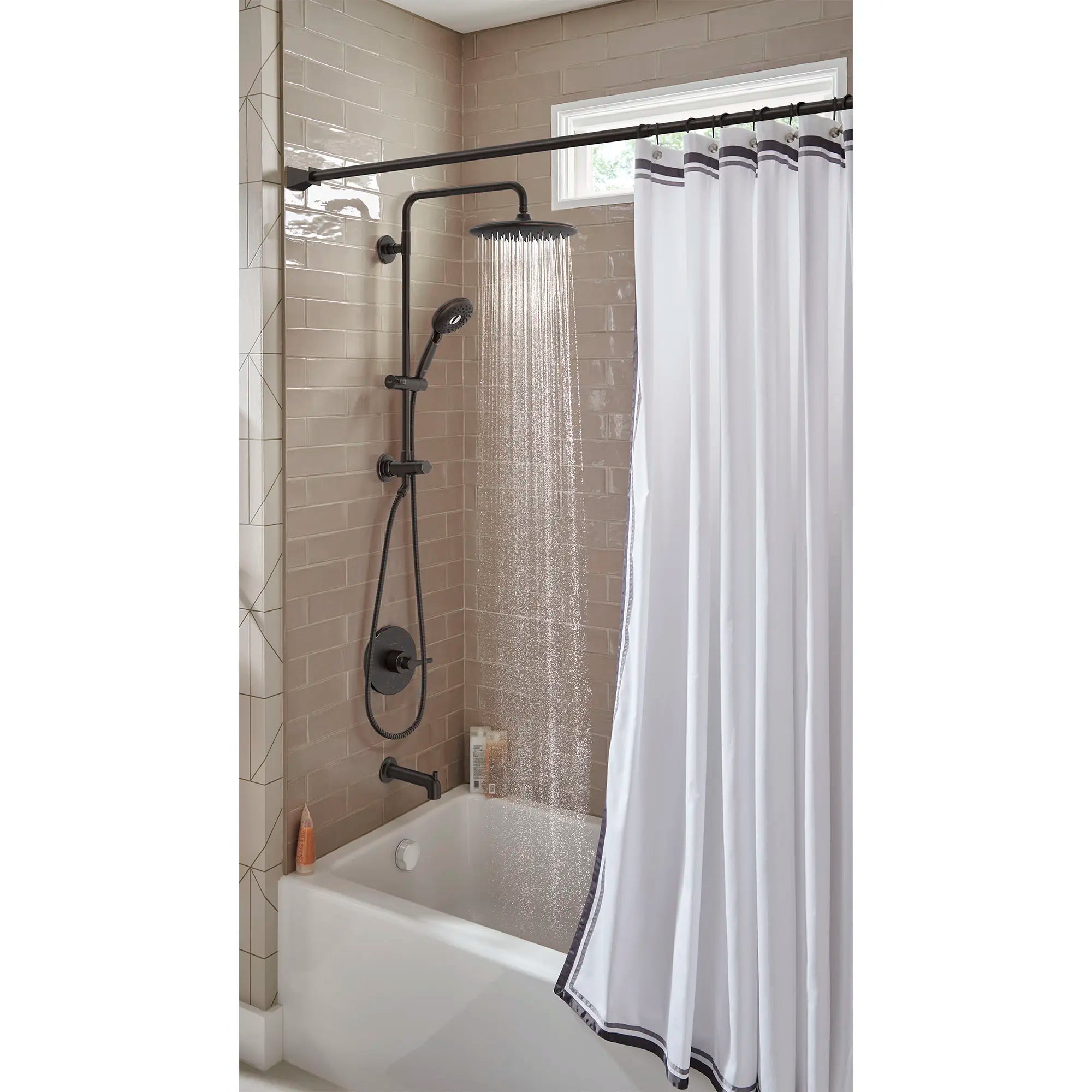 Spectra Versa® 24-Inch 4-Function 1.8 gpm/6.8 L/min Shower System With Rain Showerhead // LEGACY BRONZE // 166684_Spectra_EnvironmentCloseUp_1029072780_0002_Aug2023_0_CDNwebp.webp