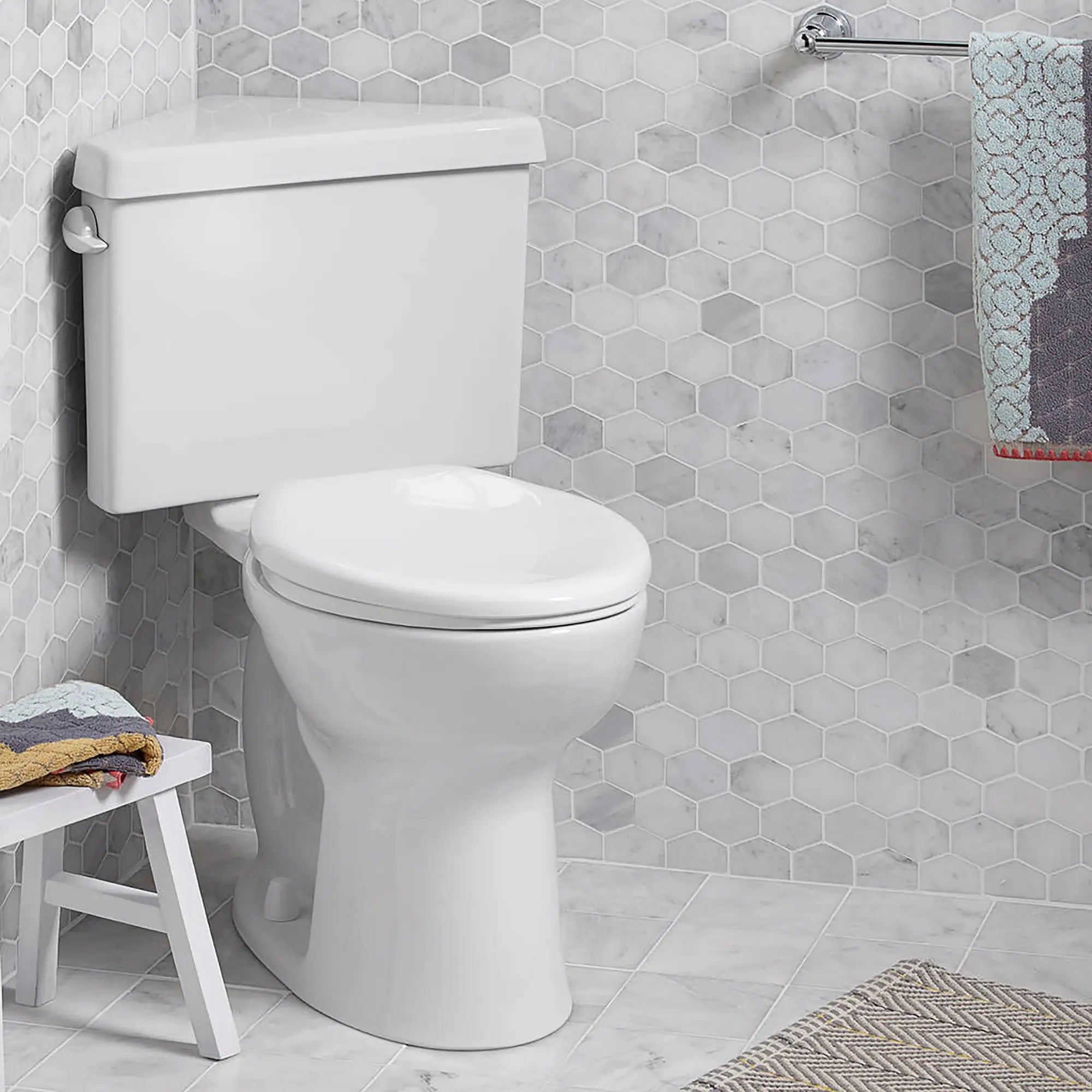 Triangle Cadet® PRO Two-Piece 1.28 gpf/4.8 Lpf Chair Height Elongated Toilet // WHITE // 174726_216AD104020_2_0_CDNwebp.webp