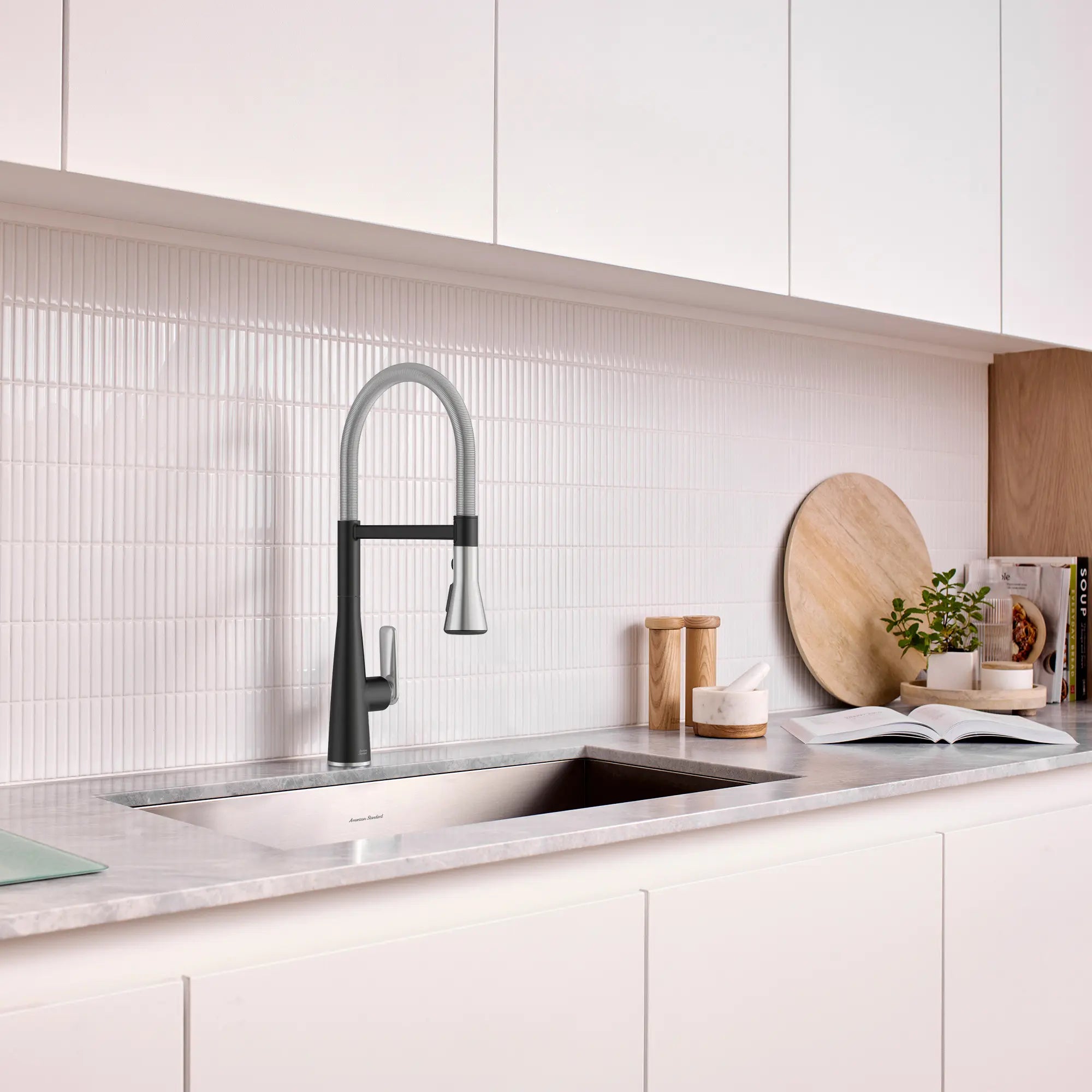 Aspirations Semi-Pro Kitchen Faucet  // MATTE BLACK/STAINLESS STEEL // 263013_Aspirations_EnvironmentCloseUp_1048824230_0001_May2025_0_CDNwebp_ef60816a-8454-49b5-befe-f3b806f41107.webp
