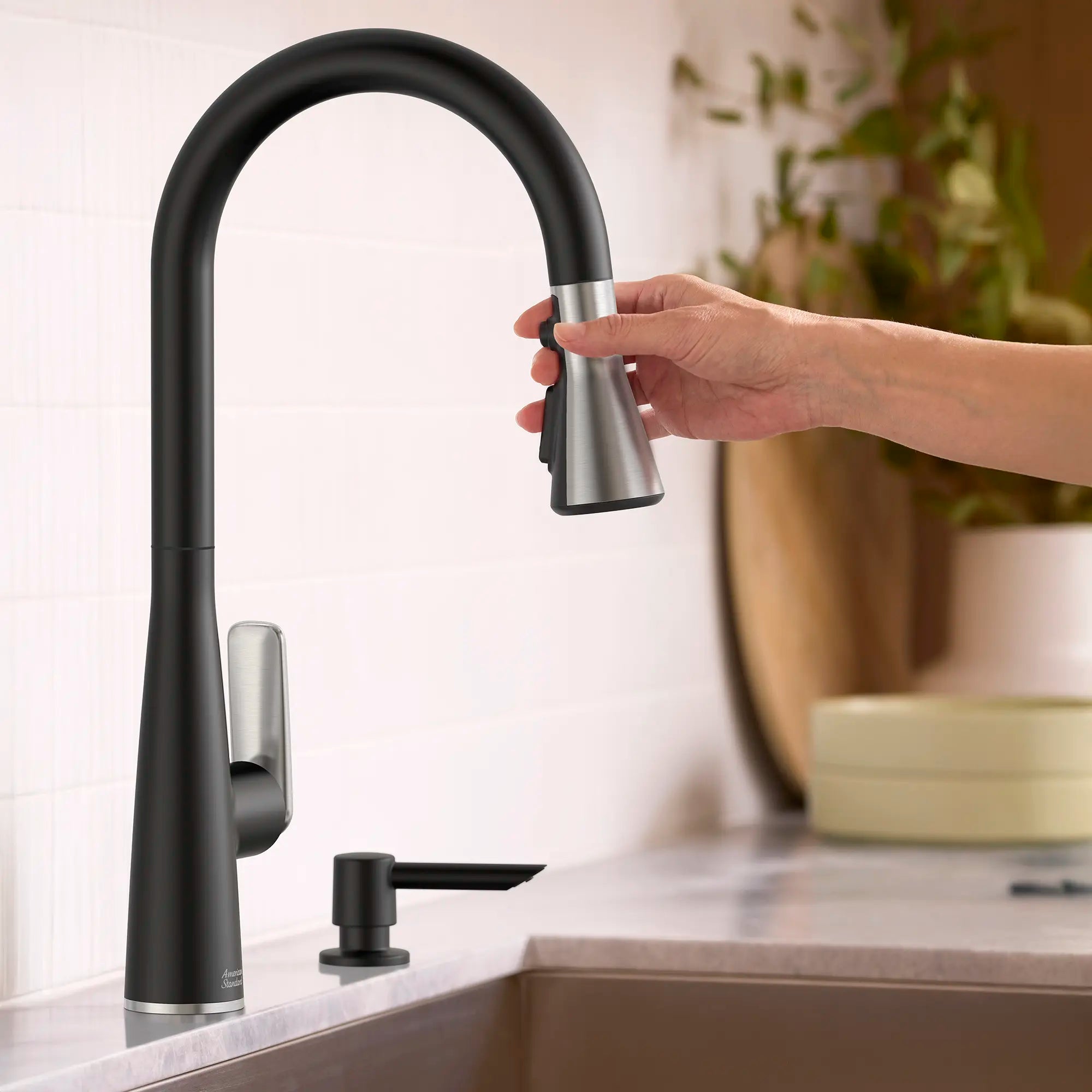Aspirations Pull-Down Kitchen Faucet  // MATTE BLACK/STAINLESS STEEL // 263729_Aspirations_EnvironmentCloseUp_1048814230_0001_APRIL2025_0_CDNwebp.webp