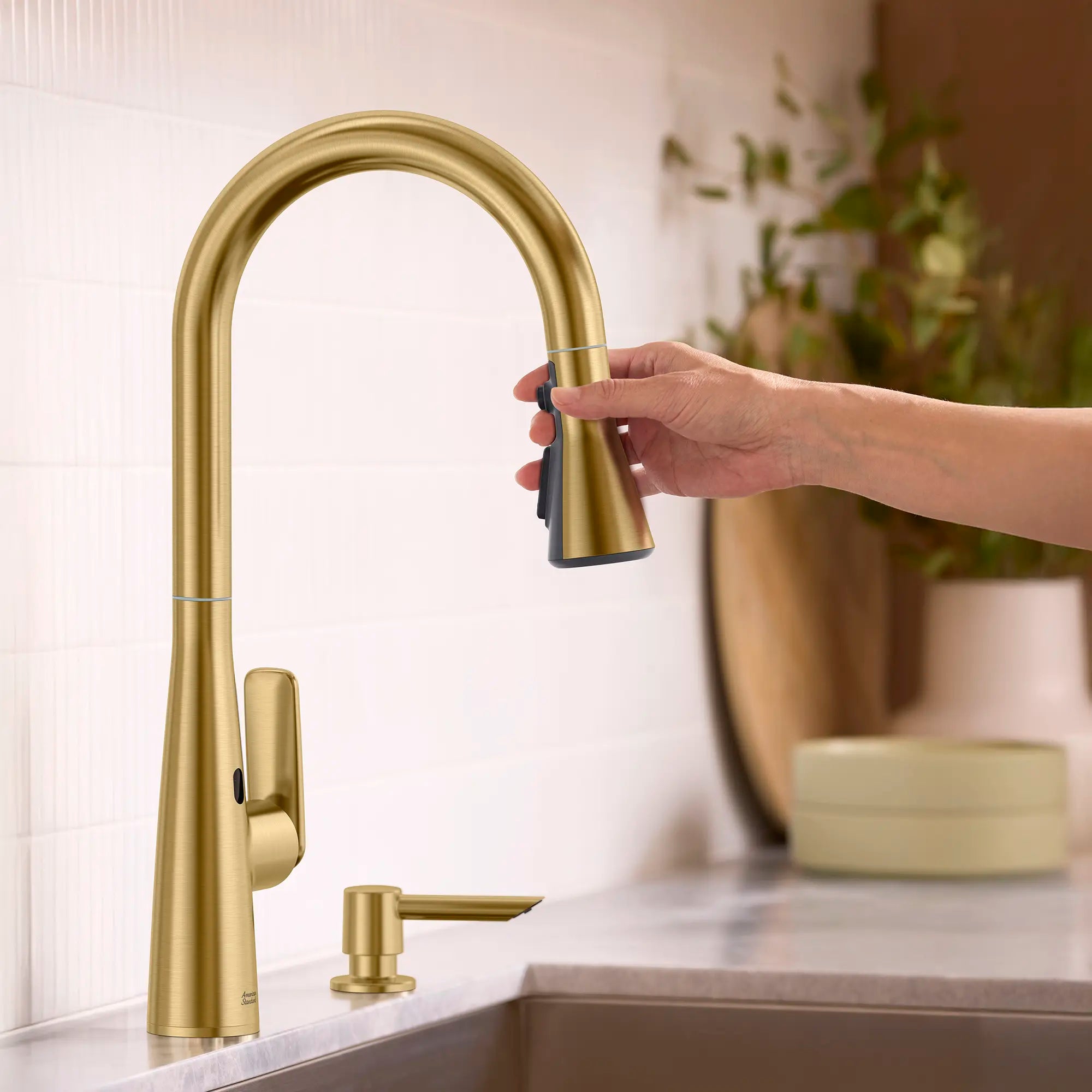 Aspirations Touchless Pull-Down Kitchen Faucet  // BRUSHED COOL SUNRISE // 263738_Aspirations_EnvironmentCloseUp_104880GN00_0004_MAY2025_0_CDNwebp_db54bef3-7cbe-44ef-95ea-a29a9971b46d.webp