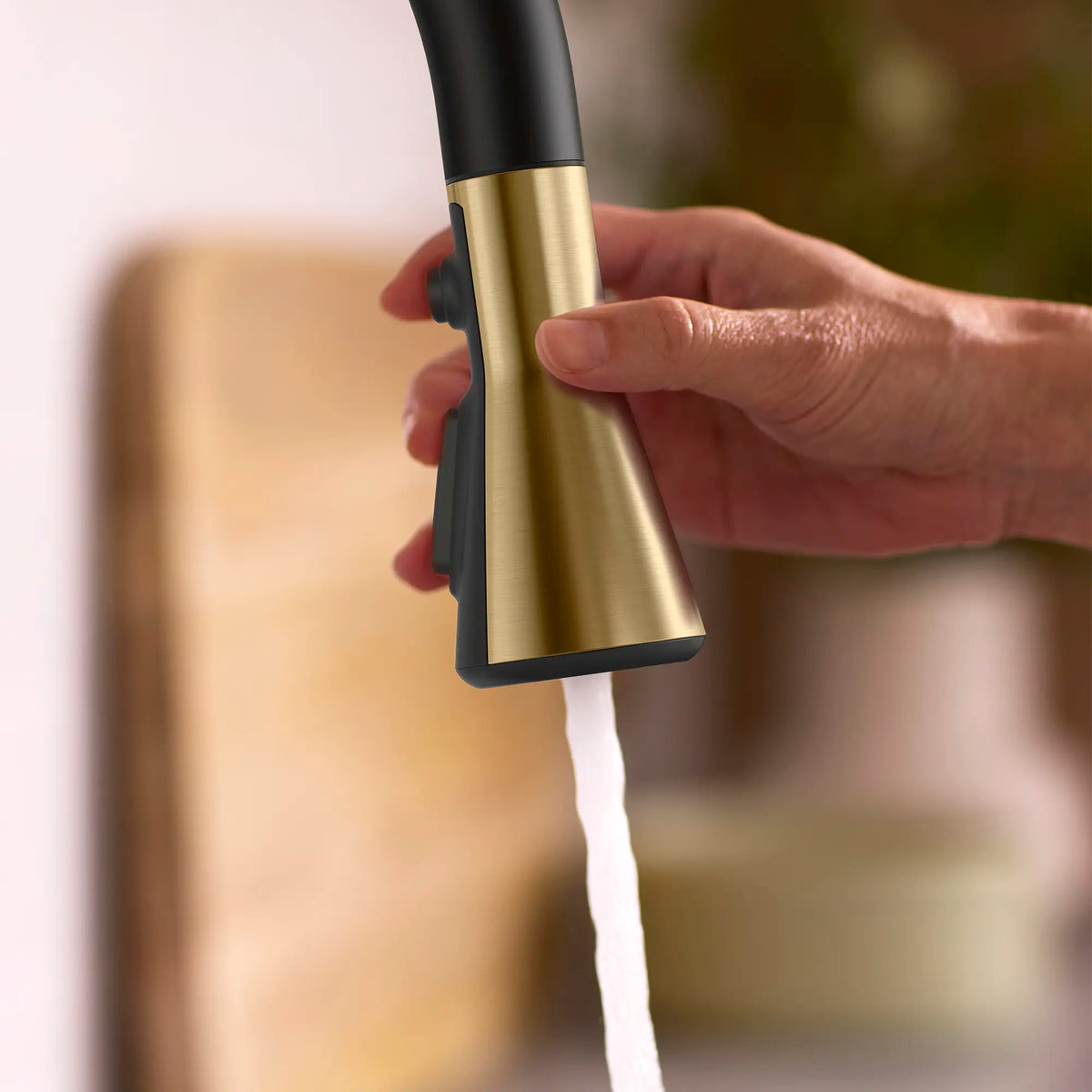 Aspirations Touchless Pull-Down Kitchen Faucet  // MATTE BLACK/BRUSH COOL SUNRISE // 263740_Aspirations_EnvironmentCloseUp_1048804240_0001_MAY2025_0_CDNwebp_65d5b64e-8787-4099-a388-56bbfce6be36.webp