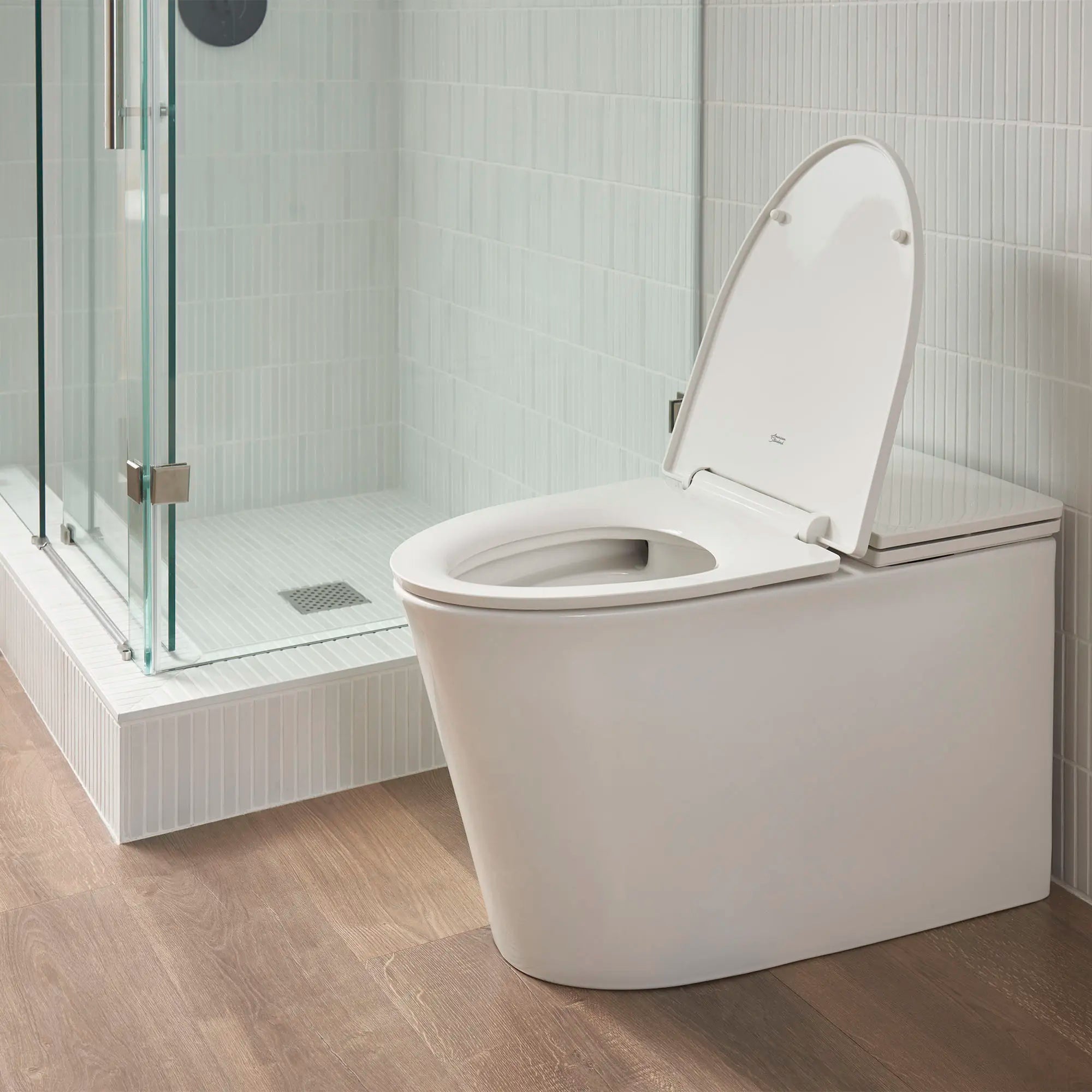 Studio® S One-Piece 1.0 gpf/3.8 Lpf Chair Height Elongated Toilet With Seat // WHITE // 70591_B-2548A100020_2_CDNwebp.webp