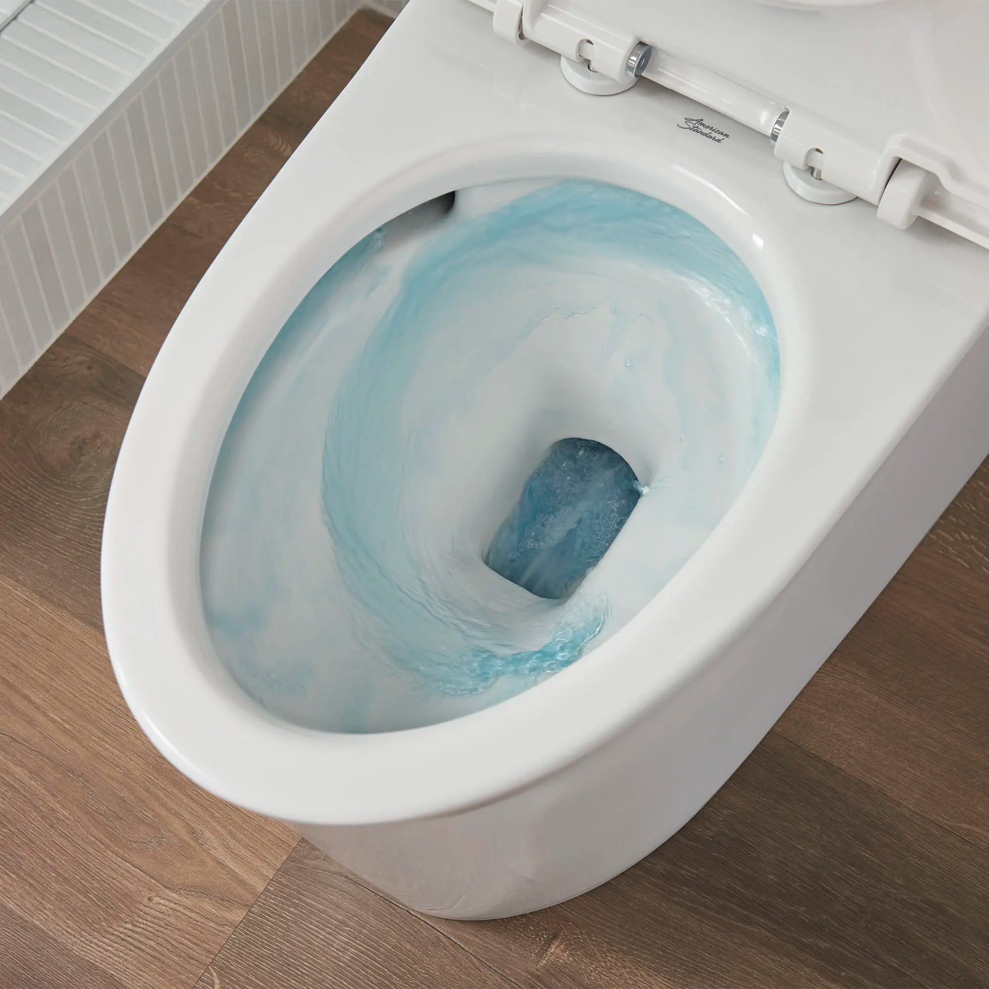 Studio® S One-Piece 1.0 gpf/3.8 Lpf Chair Height Elongated Toilet With Seat // WHITE // 70593_B-2548A100020_3_CDNwebp.webp